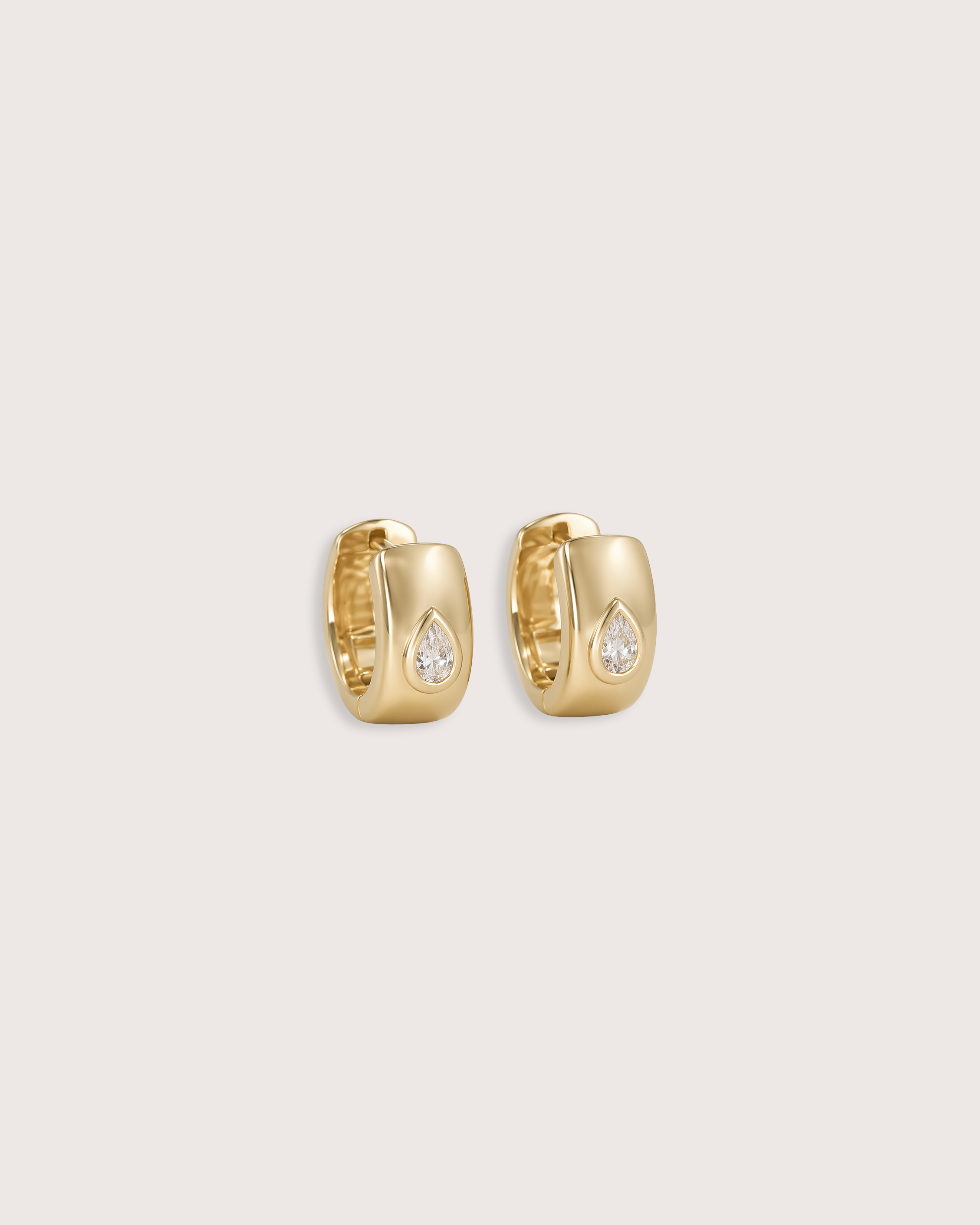 Bold Pear Diamond Huggie Earrings